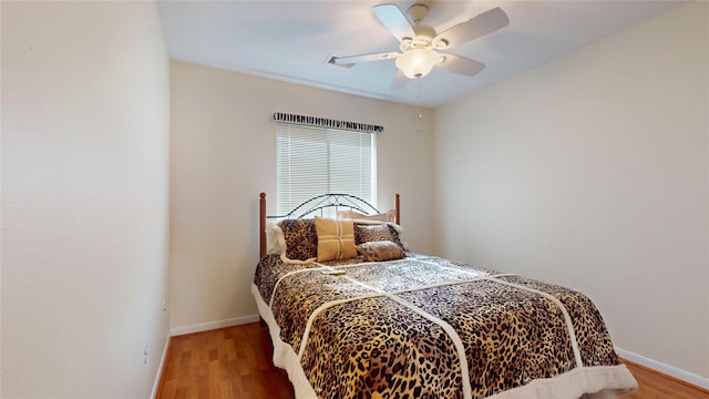 bedroom featuring ceiling fan and light hardwood / wood-style floors