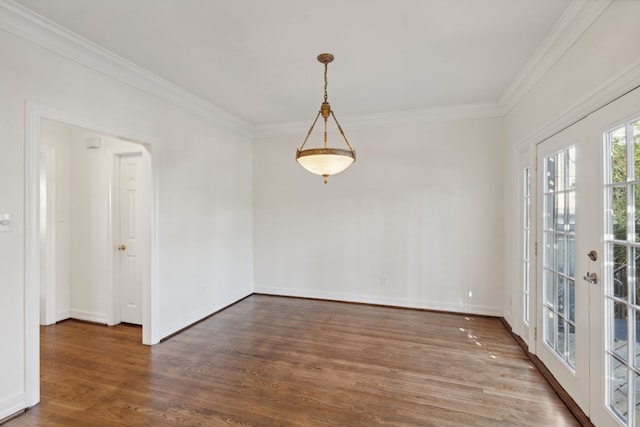 unfurnished room with crown molding, french doors, and dark hardwood / wood-style floors