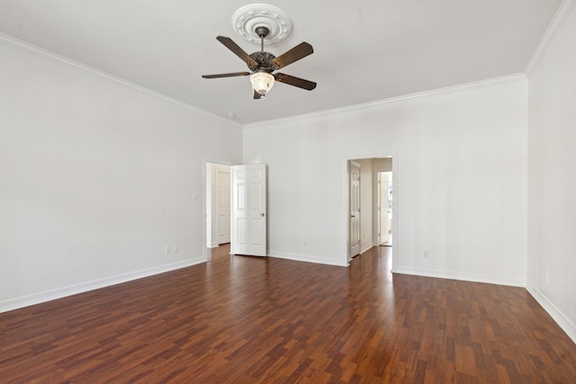 empty room featuring ceiling fan, dark hardwood / wood-style floors, and ornamental molding