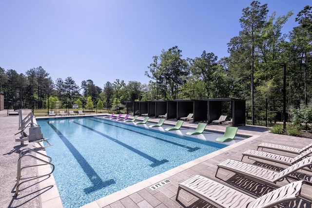 view of swimming pool featuring a patio