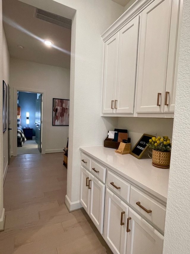 hall featuring light hardwood / wood-style flooring