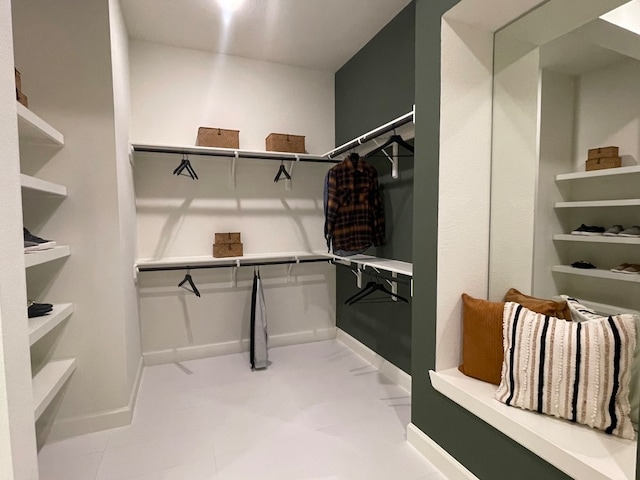 mudroom with light tile patterned flooring