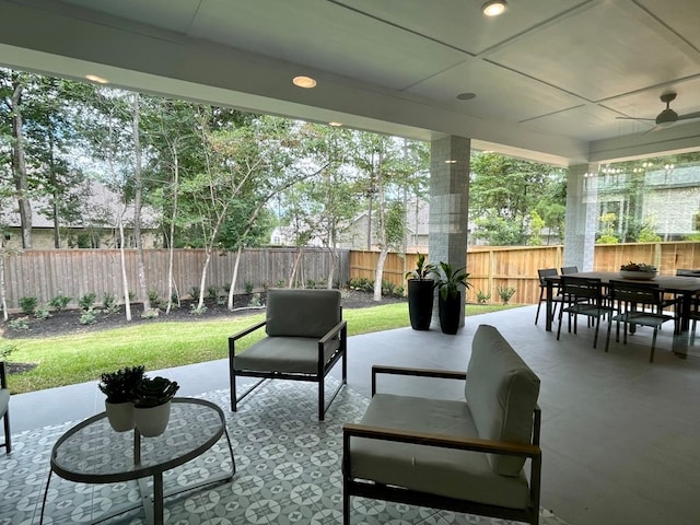 view of patio featuring outdoor lounge area and ceiling fan