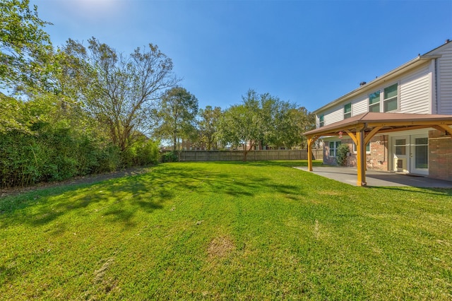 view of yard with a patio area