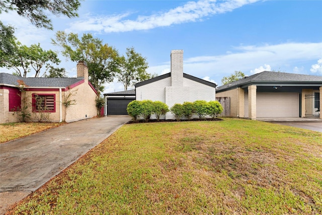 11207 Wood Lodge Dr, Houston, TX 77077 - view of property exterior with asphalt driveway, a lawn, brick siding, a chimney, and a garage