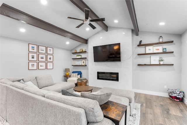 11207 Wood Lodge Dr, Houston, TX 77077 - living area featuring wood finished floors, a ceiling fan, a premium fireplace, recessed lighting, and baseboards