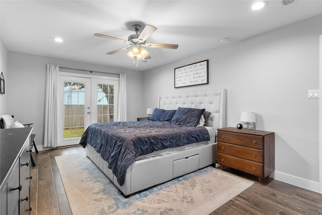 11207 Wood Lodge Dr, Houston, TX 77077 - bedroom featuring french doors, access to exterior, dark wood-type flooring, recessed lighting, and baseboards