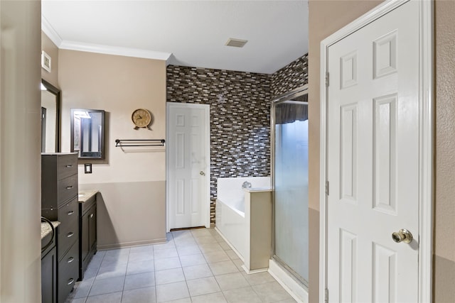 bathroom featuring vanity, ornamental molding, shower with separate bathtub, and tile patterned floors