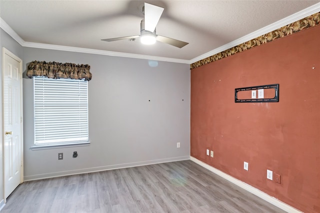 unfurnished room featuring a textured ceiling, light hardwood / wood-style floors, ceiling fan, and crown molding