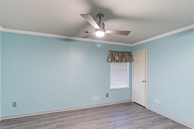 unfurnished room with crown molding, ceiling fan, a textured ceiling, and light wood-type flooring