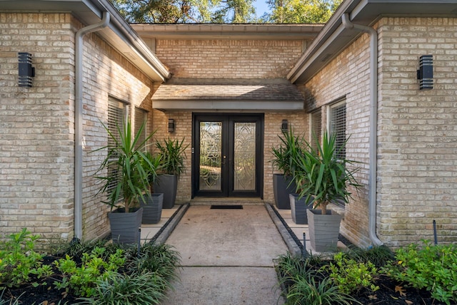 property entrance featuring french doors