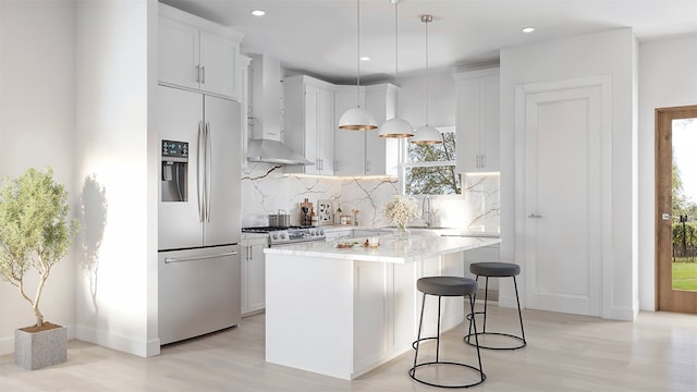 kitchen featuring white cabinetry, a center island, pendant lighting, and appliances with stainless steel finishes