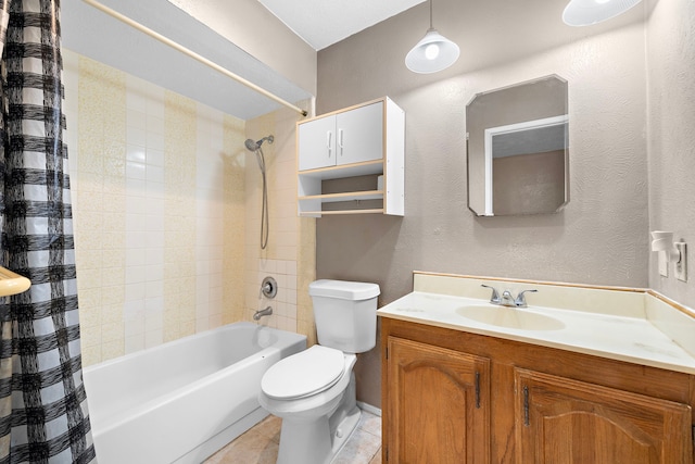 full bathroom featuring vanity, shower / tub combo, toilet, and tile patterned flooring