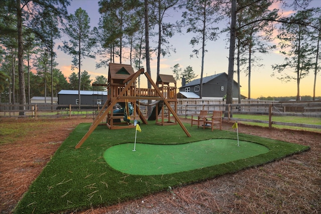 view of playground at dusk