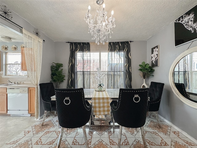 dining area with light tile patterned floors, a textured ceiling, and an inviting chandelier