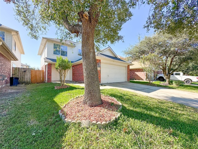 view of front of house featuring a front yard and a garage