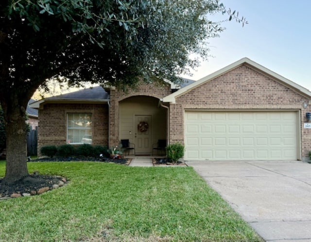 single story home with a front lawn and a garage