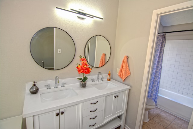 full bathroom with tile patterned floors, toilet, vanity, and shower / bath combination with curtain