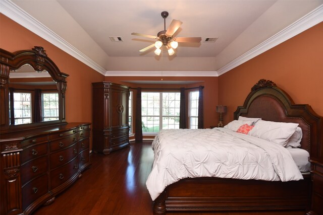 bedroom with ceiling fan, crown molding, and dark hardwood / wood-style floors