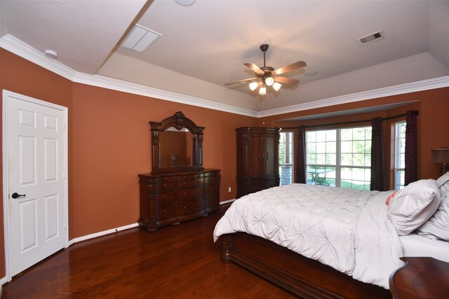 bedroom featuring ceiling fan, dark hardwood / wood-style floors, and ornamental molding