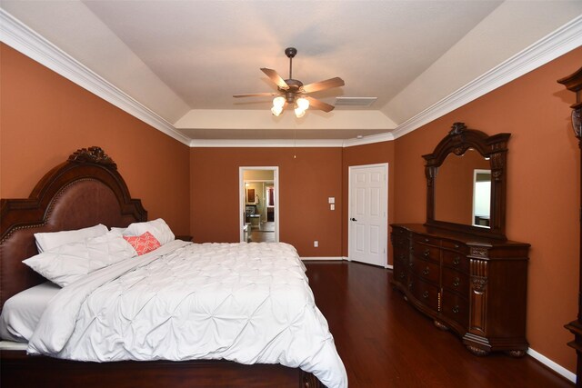 18526 W Laura Shore Dr, Cypress, TX 77433 - bedroom with dark wood-style flooring, a tray ceiling, vaulted ceiling, baseboards, and crown molding