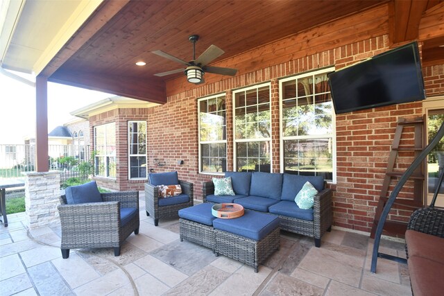 view of patio featuring an outdoor hangout area and ceiling fan