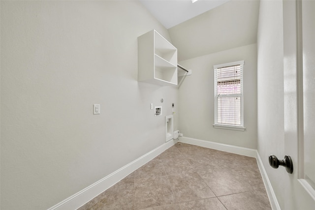 laundry room with electric dryer hookup, gas dryer hookup, light tile patterned flooring, and washer hookup