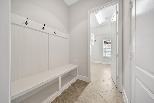 mudroom with light tile patterned flooring