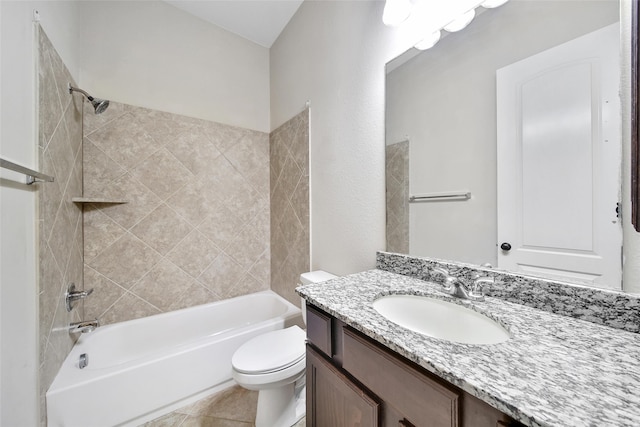 full bathroom with vanity, toilet, tile patterned flooring, and tiled shower / bath combo