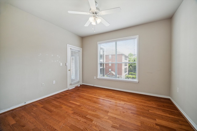 empty room with light hardwood / wood-style flooring and ceiling fan