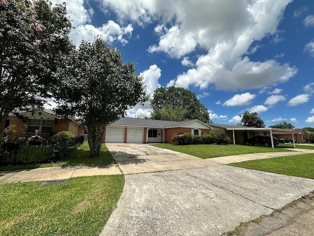 view of front of house featuring a front yard and a carport