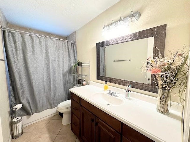 full bathroom with shower / bath combo with shower curtain, tile patterned flooring, vanity, and toilet