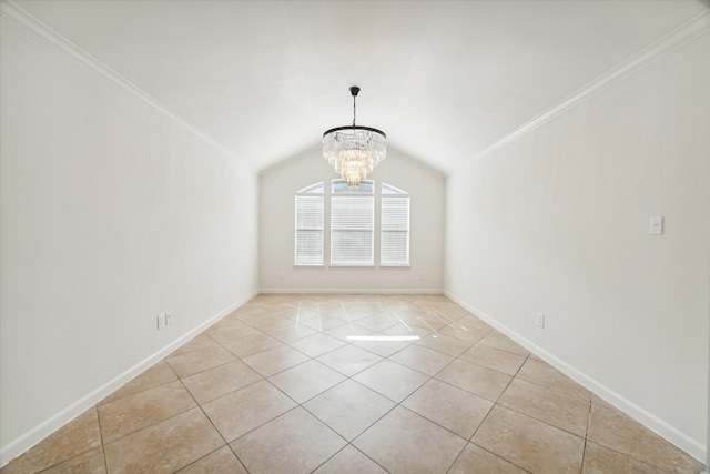 spare room featuring crown molding, light tile patterned floors, vaulted ceiling, and an inviting chandelier