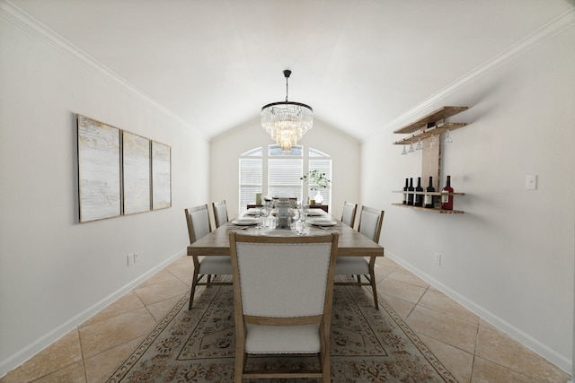 dining room with crown molding, light tile patterned flooring, a chandelier, and vaulted ceiling