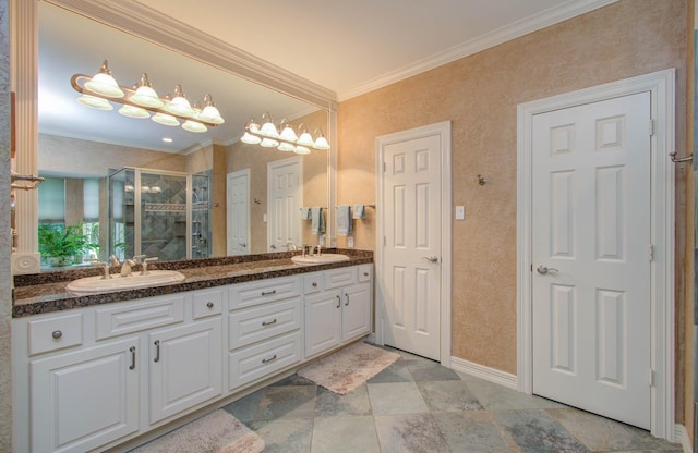 bathroom featuring an enclosed shower, vanity, and crown molding