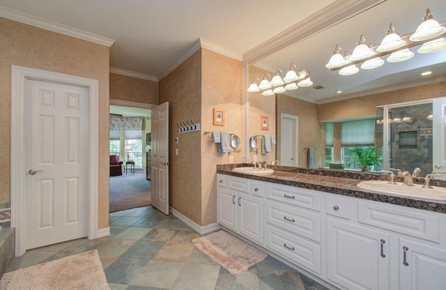 bathroom with vanity and ornamental molding