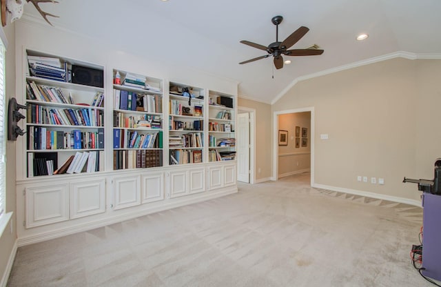 unfurnished room with light carpet, ornamental molding, and lofted ceiling