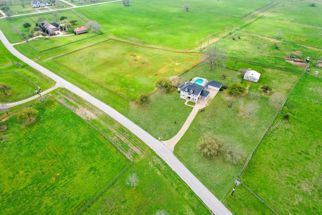 birds eye view of property featuring a rural view