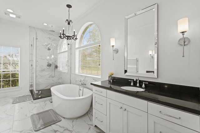 bathroom featuring vanity, crown molding, plus walk in shower, and an inviting chandelier