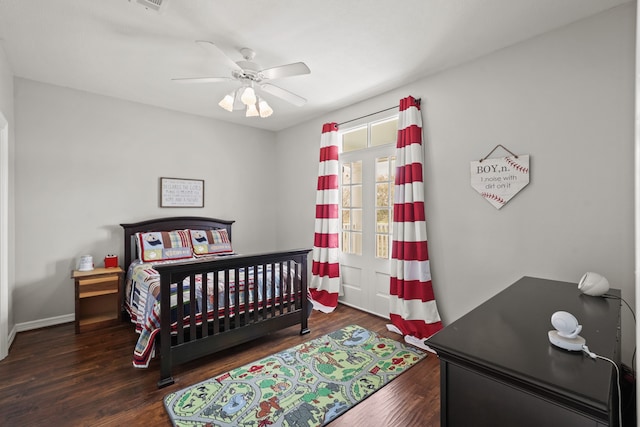 bedroom featuring ceiling fan and dark hardwood / wood-style flooring