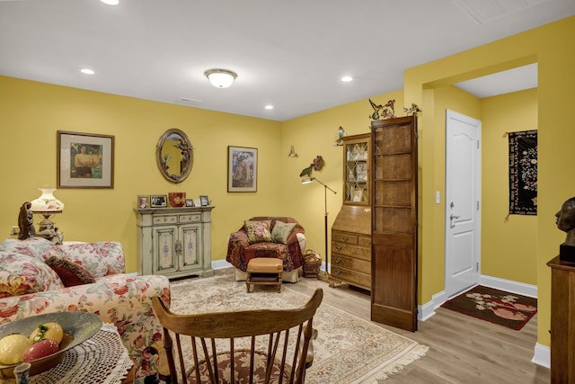 sitting room with light hardwood / wood-style floors