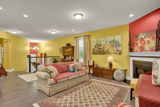 living room featuring hardwood / wood-style flooring and a notable chandelier