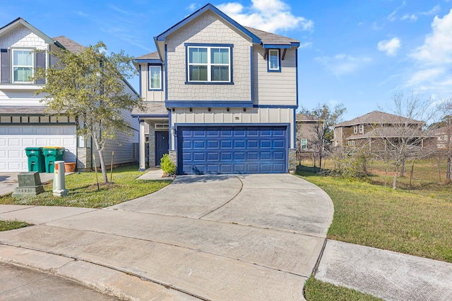 view of front facade featuring a front lawn and a garage