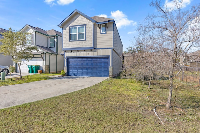 view of front of house with a garage and a front lawn