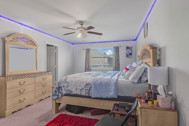 bedroom featuring ceiling fan and carpet floors