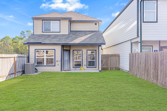 back of property featuring a patio area, a yard, and cooling unit