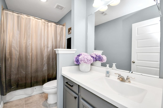 12810 Ilderton Dr, Humble, TX 77346 - bathroom featuring toilet, vanity, and tile patterned flooring