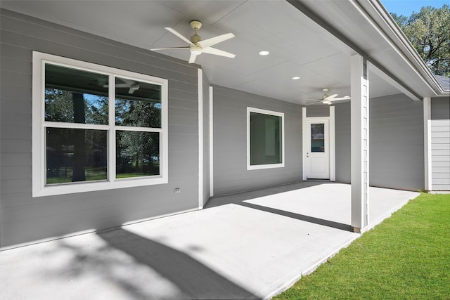 view of patio / terrace featuring ceiling fan