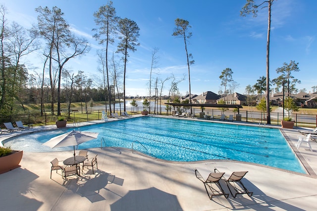 view of pool featuring a patio area