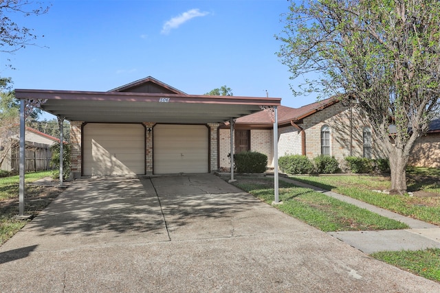 ranch-style home with a garage and a front lawn